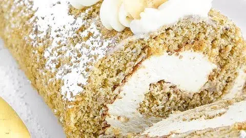 Delicious banana roll dessert featuring sweet bananas and creamy layers