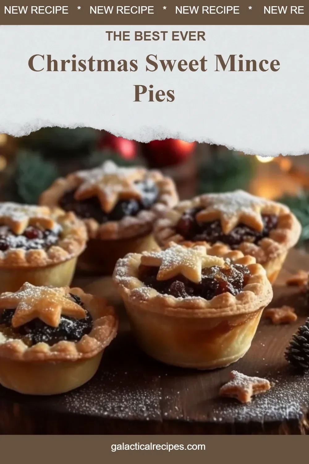 A plate of Christmas sweet mince pies dusted with powdered sugar.