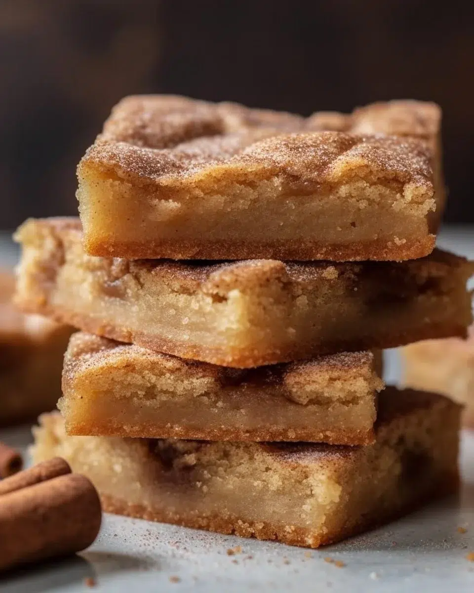 Delicious cinnamon sugar blondies topped with a honey glaze, perfect for dessert.