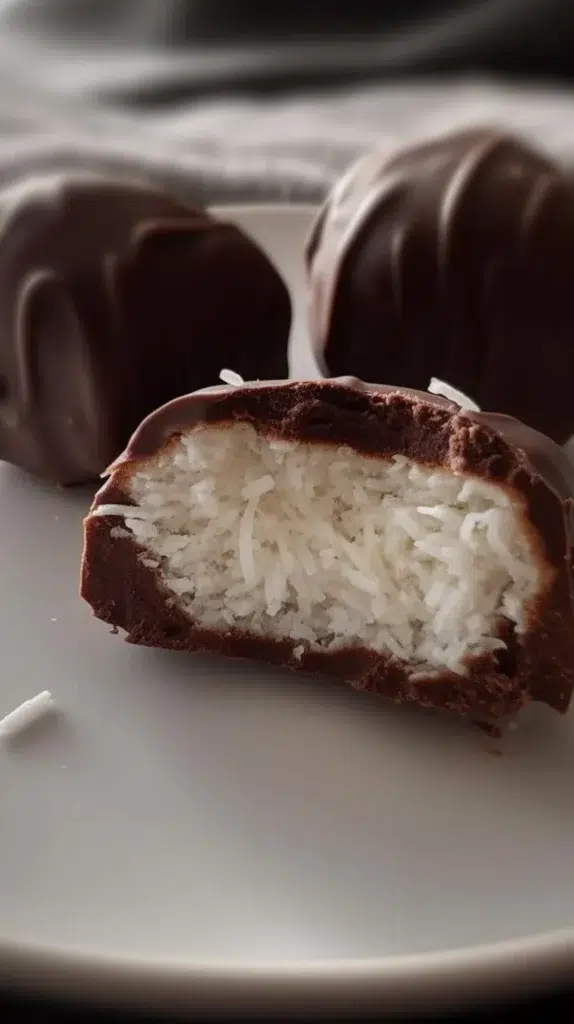 Delicious homemade Chocolate Coconut Bars with rich chocolate and coconut topping