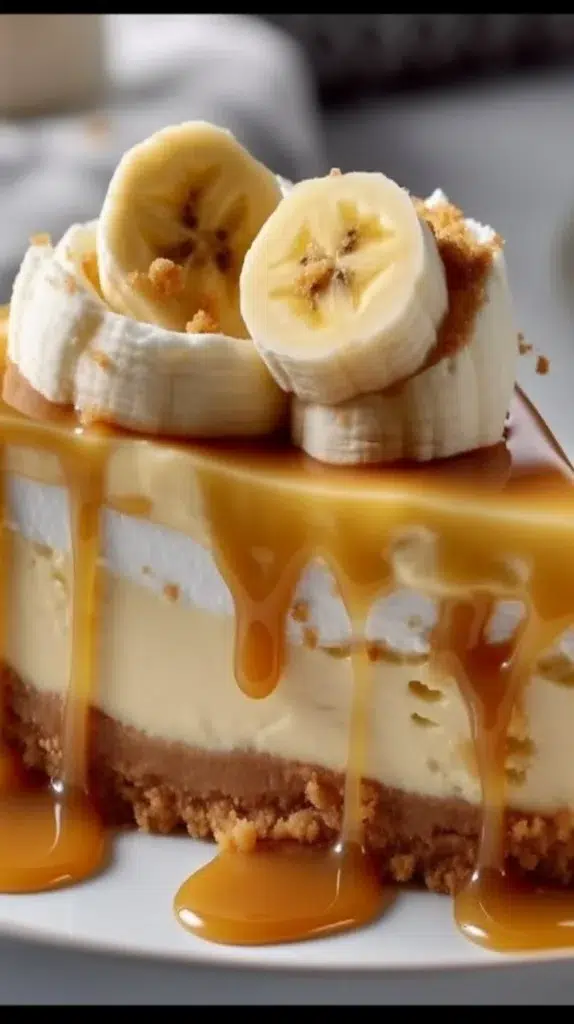 Delicious banana pudding cheesecake topped with banana slices and whipped cream