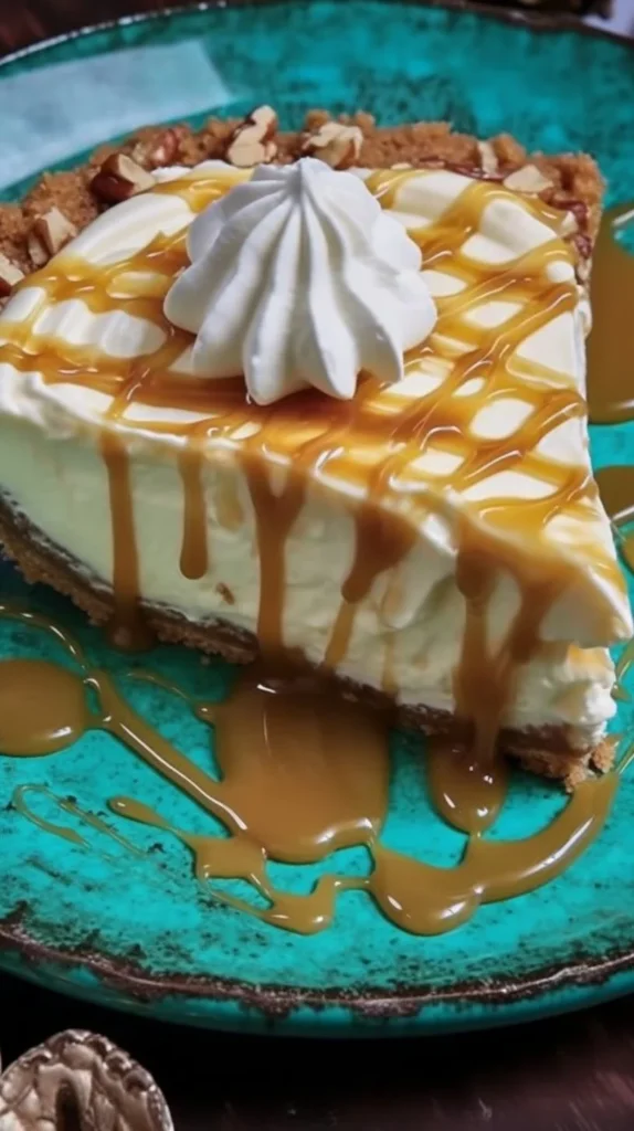 Slice of salted caramel banana pie with whipped cream on a plate