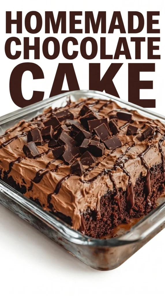 Delicious slice of chocolate poke cake topped with chocolate frosting and sprinkles