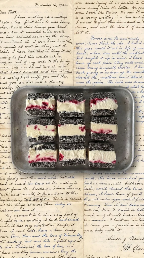 Five-ingredient lamington ice cream sandwiches on a wooden platter