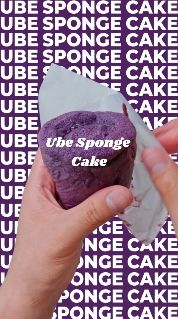 Delicious Ube and Sweet Potato Cake topped with cream and colorful sprinkles